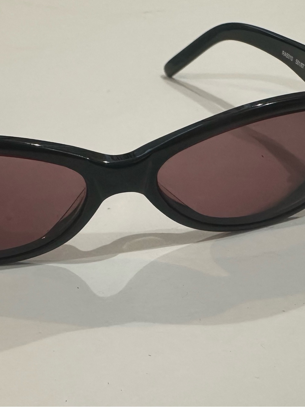 Ralph Lauren Black Oval Sunglasses with Plum Lenses